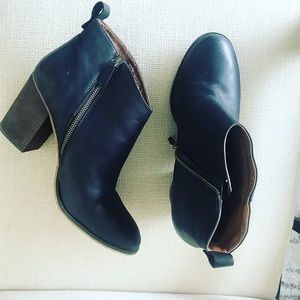 B. P. Leather black booties